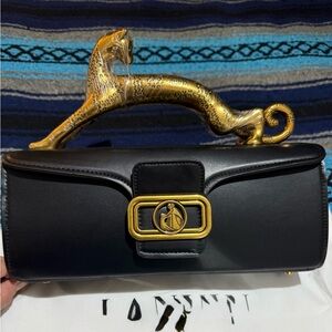 Elegant Black Cat Handbag with Gold Accents